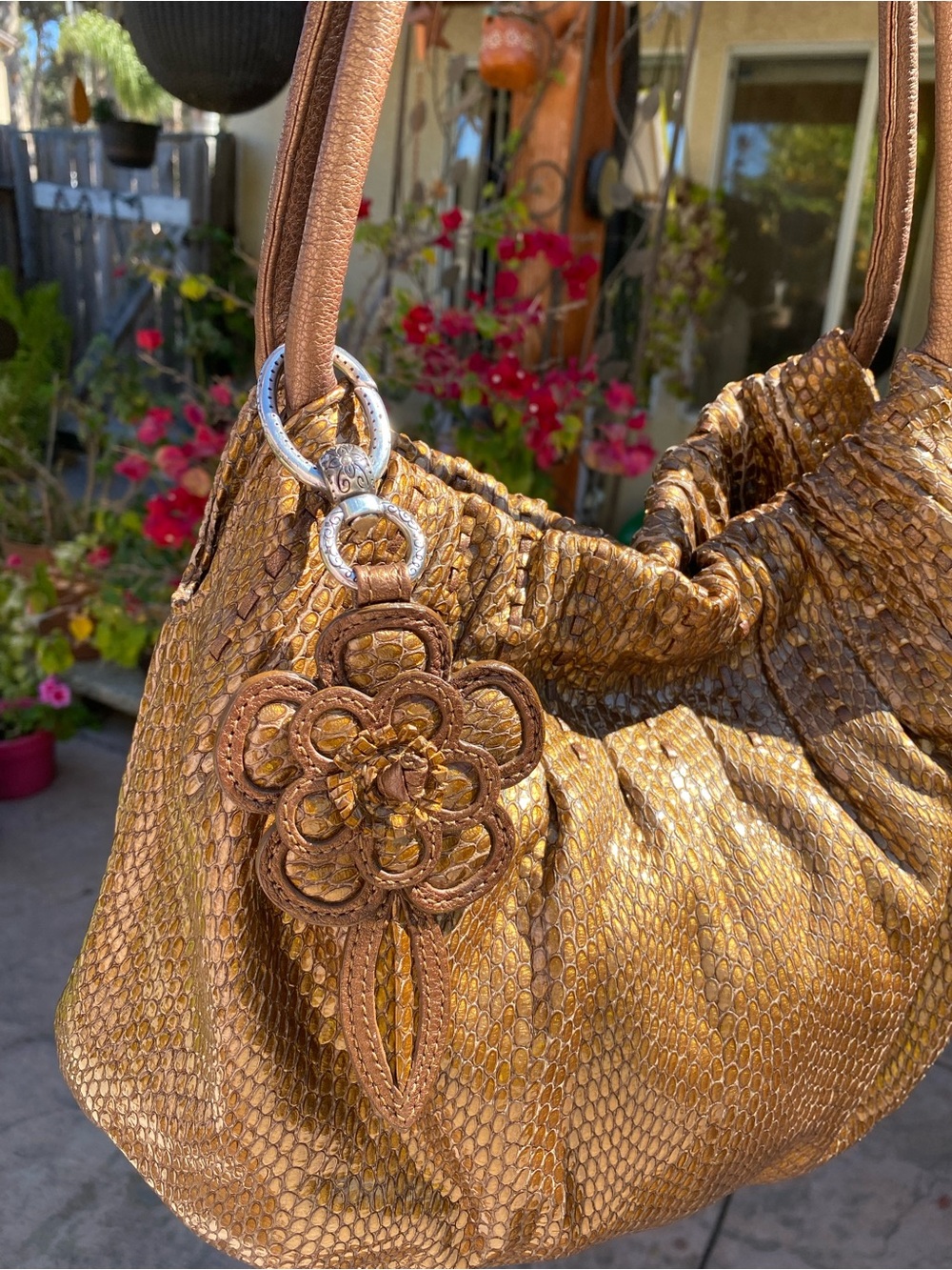 Brighton hobo bag with flower charm